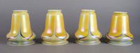 A Set of Four Iridescent Glass Shades, Quezal or Steuben, Height 5 1/4 inches.