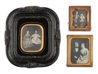 [EARLY PHOTOGRAPHY]. 14 charming cased images of family pairs and groups, mostly daguerreotypes.