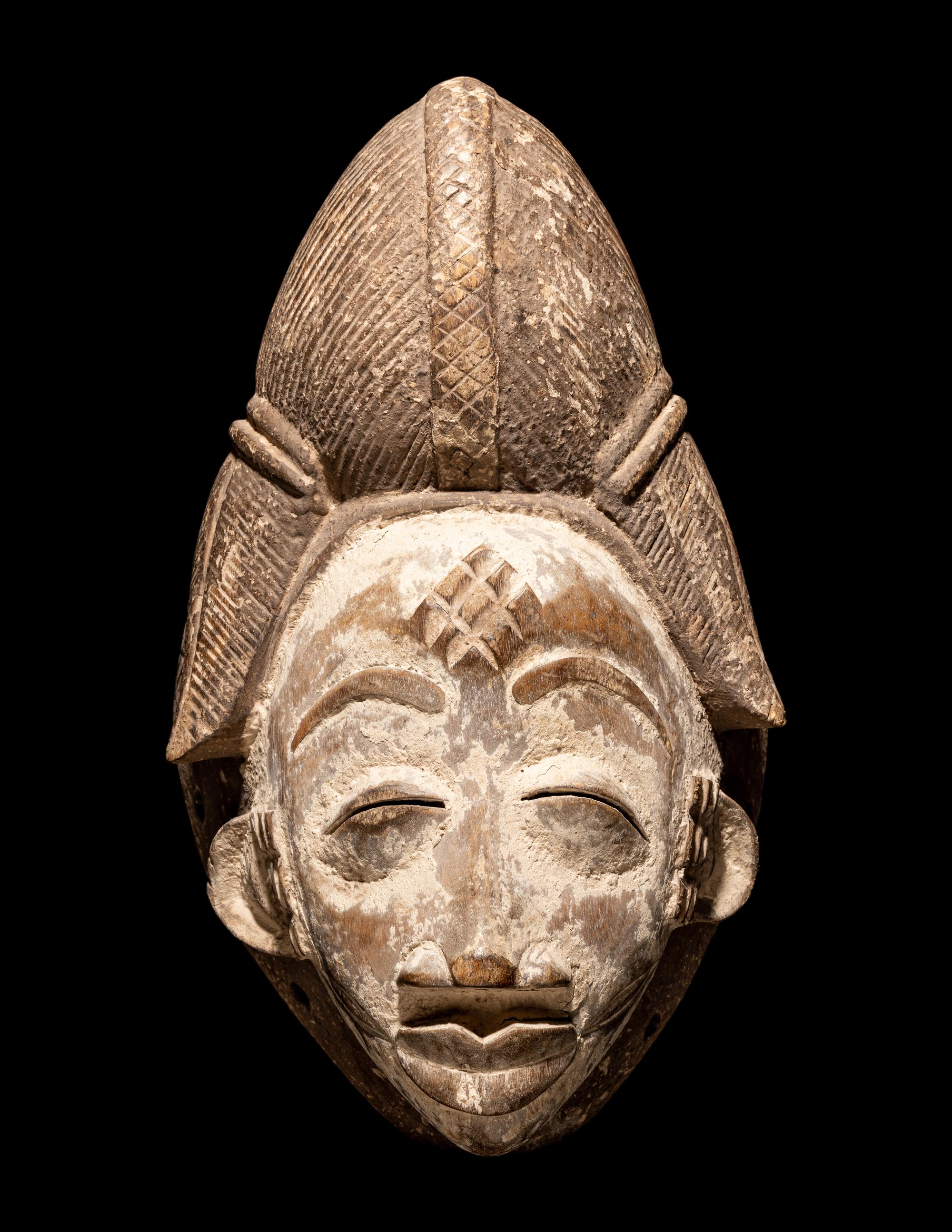 Four Punu Wood Masks