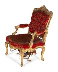 An Italian Rococo Style Giltwood Armchair