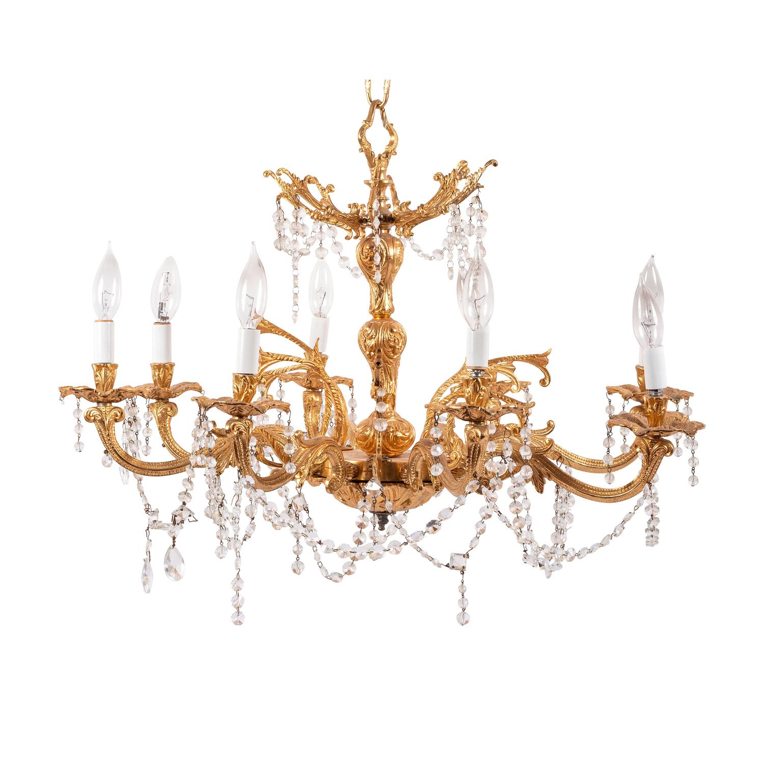 A Louis XV Style Gilt Metal and Cut-Glass Eight-Light Chandelier