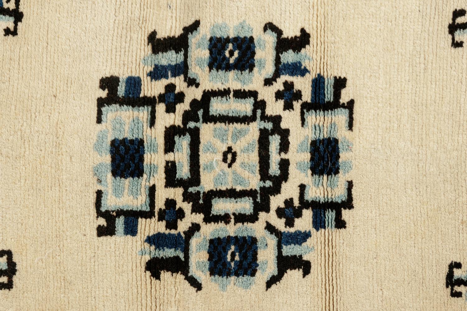 A Chinese Blue and White Wool Runner