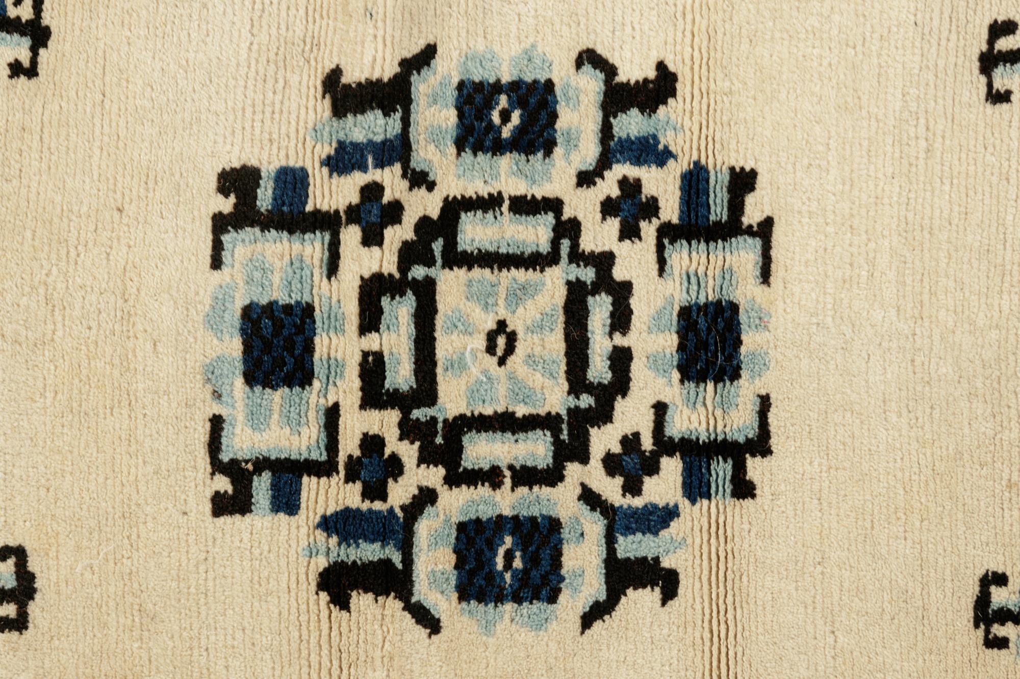A Chinese Blue and White Wool Runner
