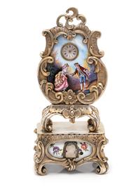 GILT-METAL AND ENAMEL CLOCK WITH HIDDEN AUTOMATON