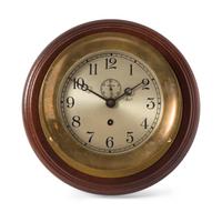 A Chelsea Brass Ship's Clock Diameter 9 1/2 inches. — 20TH CENTURY