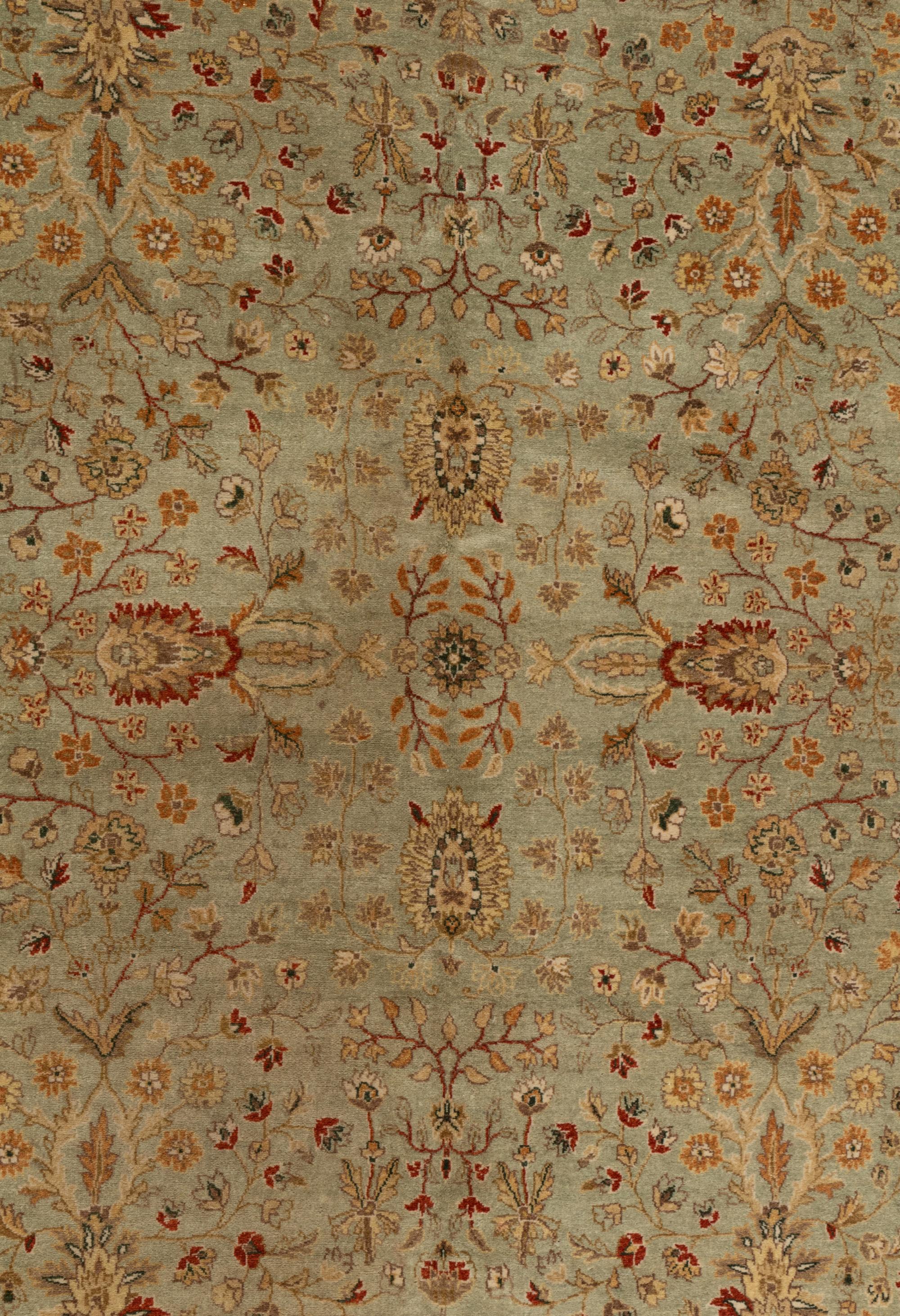 An Agra Design Wool Rug