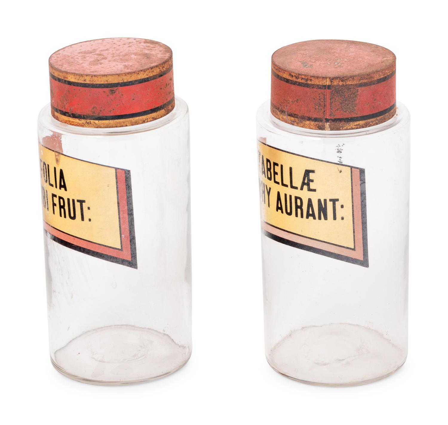 A Pair of Clear Glass Apothecary Jars