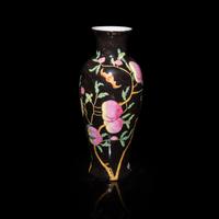 A Chinese Black Ground Famille Rose Porcelain 'Bat and Peach' Vase, 20th Century — 近代 黑地福桃紋觀音瓶