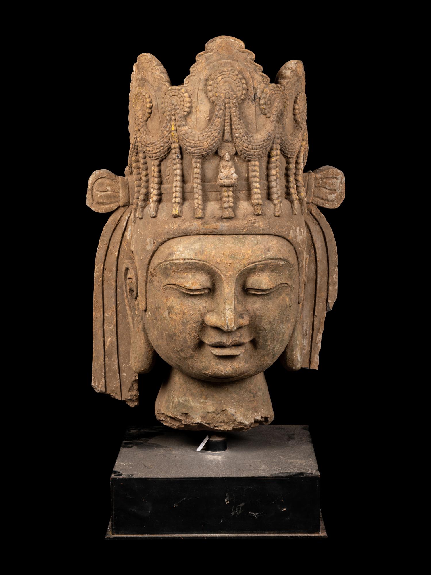 A Chinese Monumental Carved Stone Head