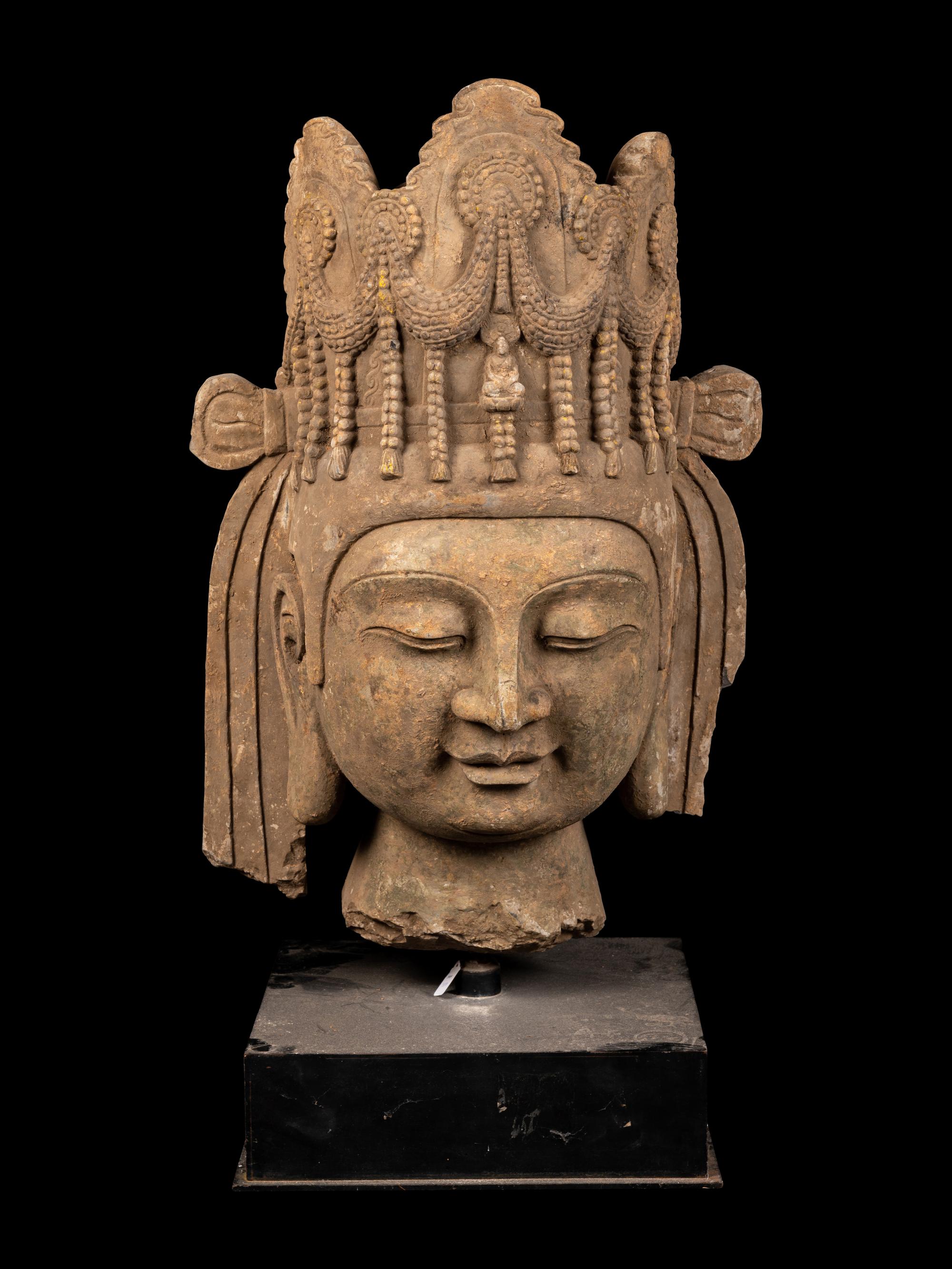 A Chinese Monumental Carved Stone Head