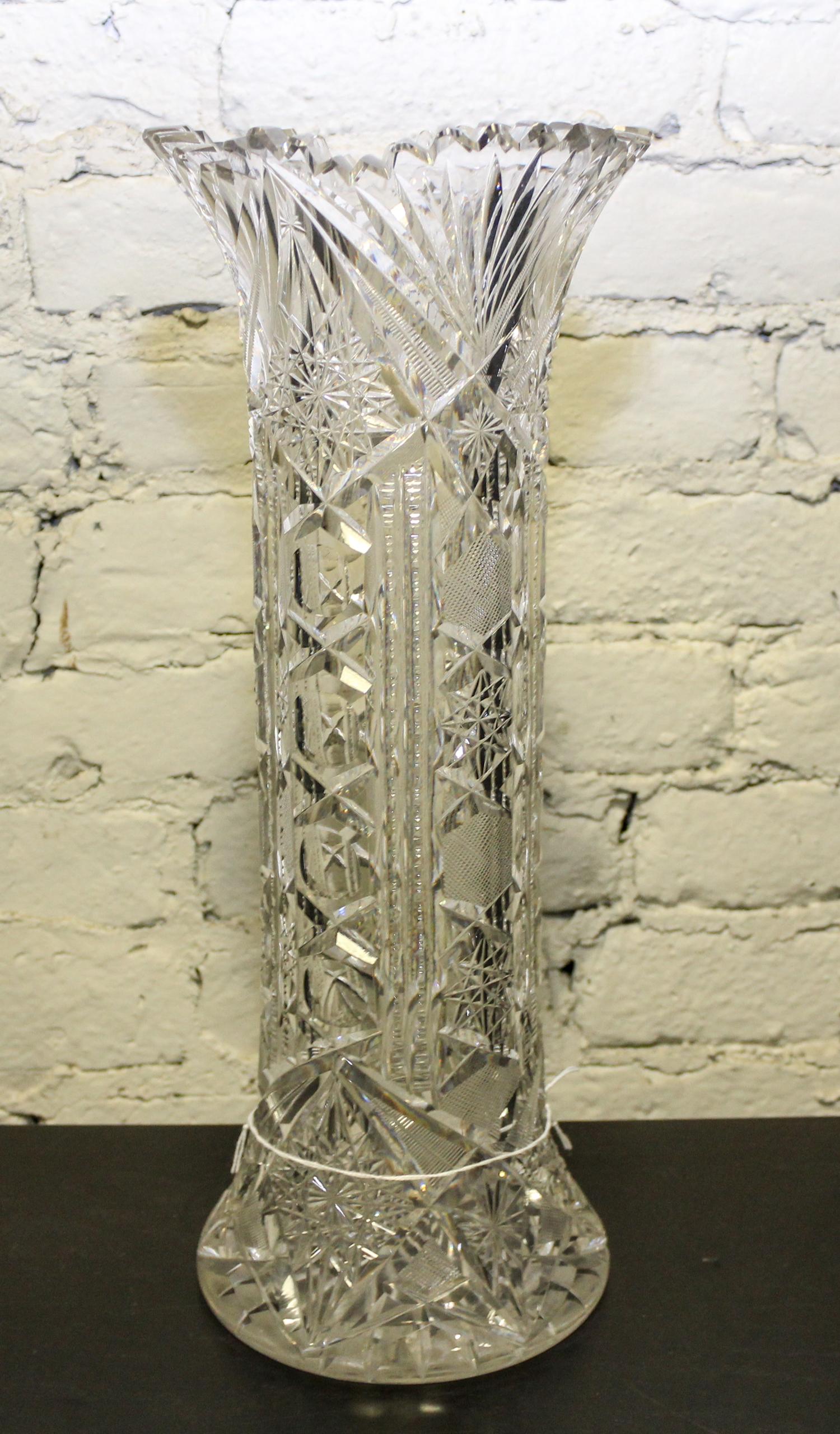 A Cut Glass Vase. Height 16 1/2 inches.