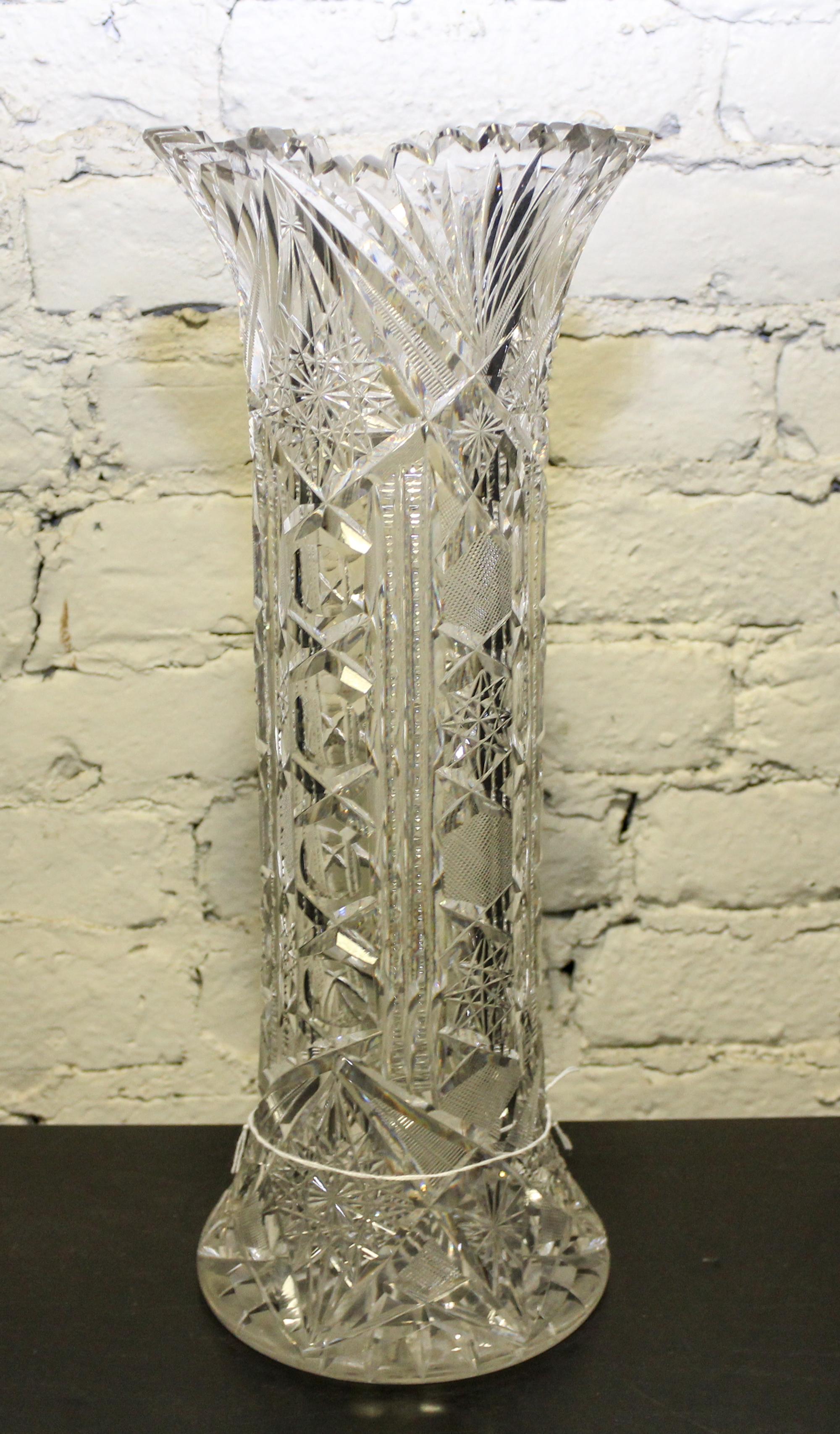 A Cut Glass Vase. Height 16 1/2 inches.