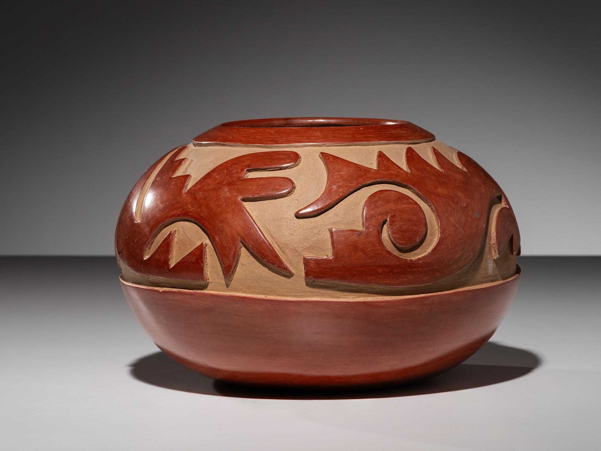 Carved Redware Pottery Jar, with Avanyu