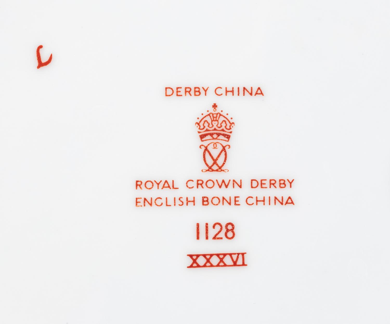 A Royal Crown Derby Imari Porcelain Dinner Service