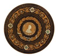 An Italian Ivory and Mother-of-Pearl Inlaid Roundel, Diameter 18 3/4 inches.