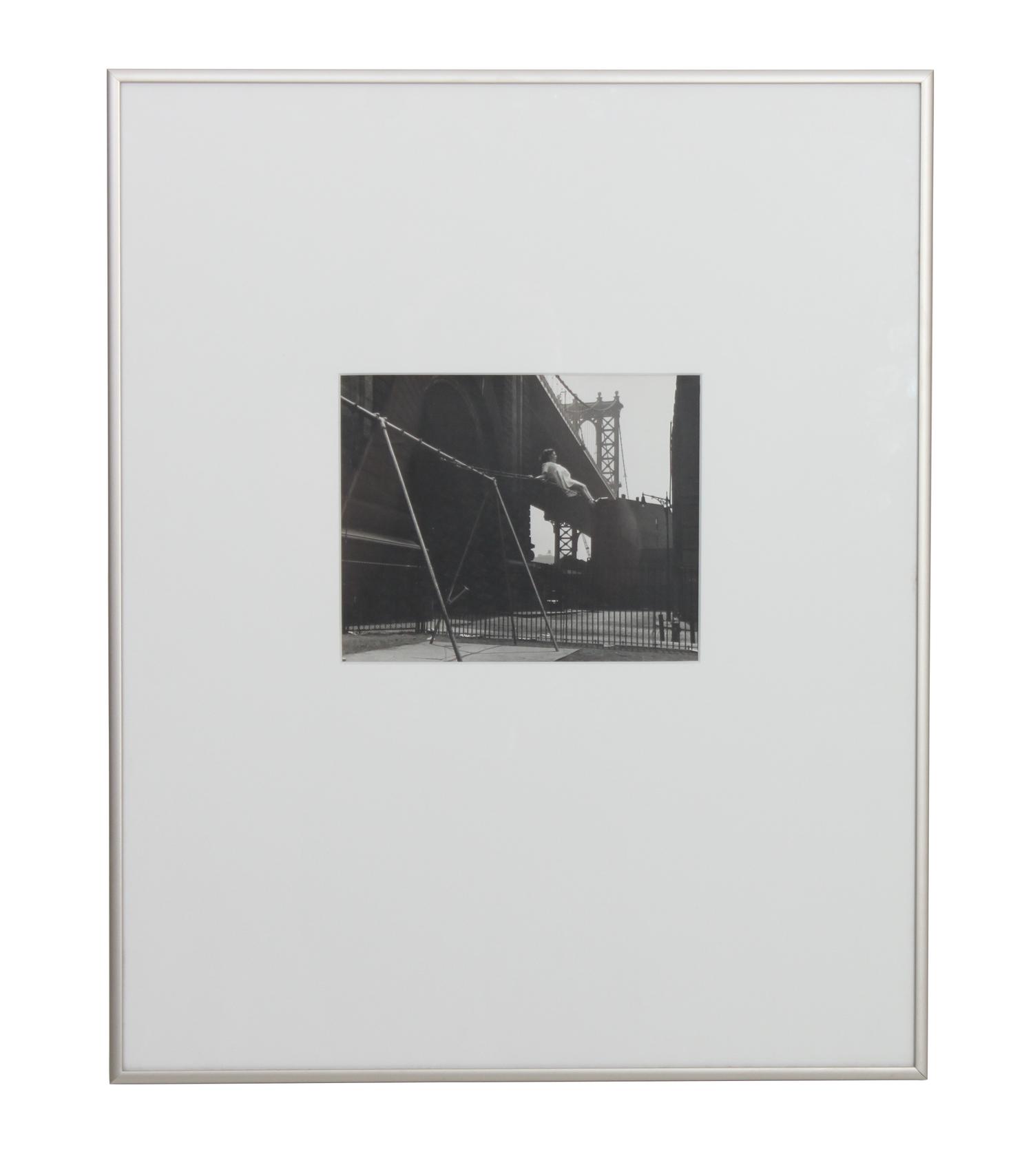 Walter Rosenblum, (American, 1919-2000), Girl on Swing, Pitt Street, New York, 1938