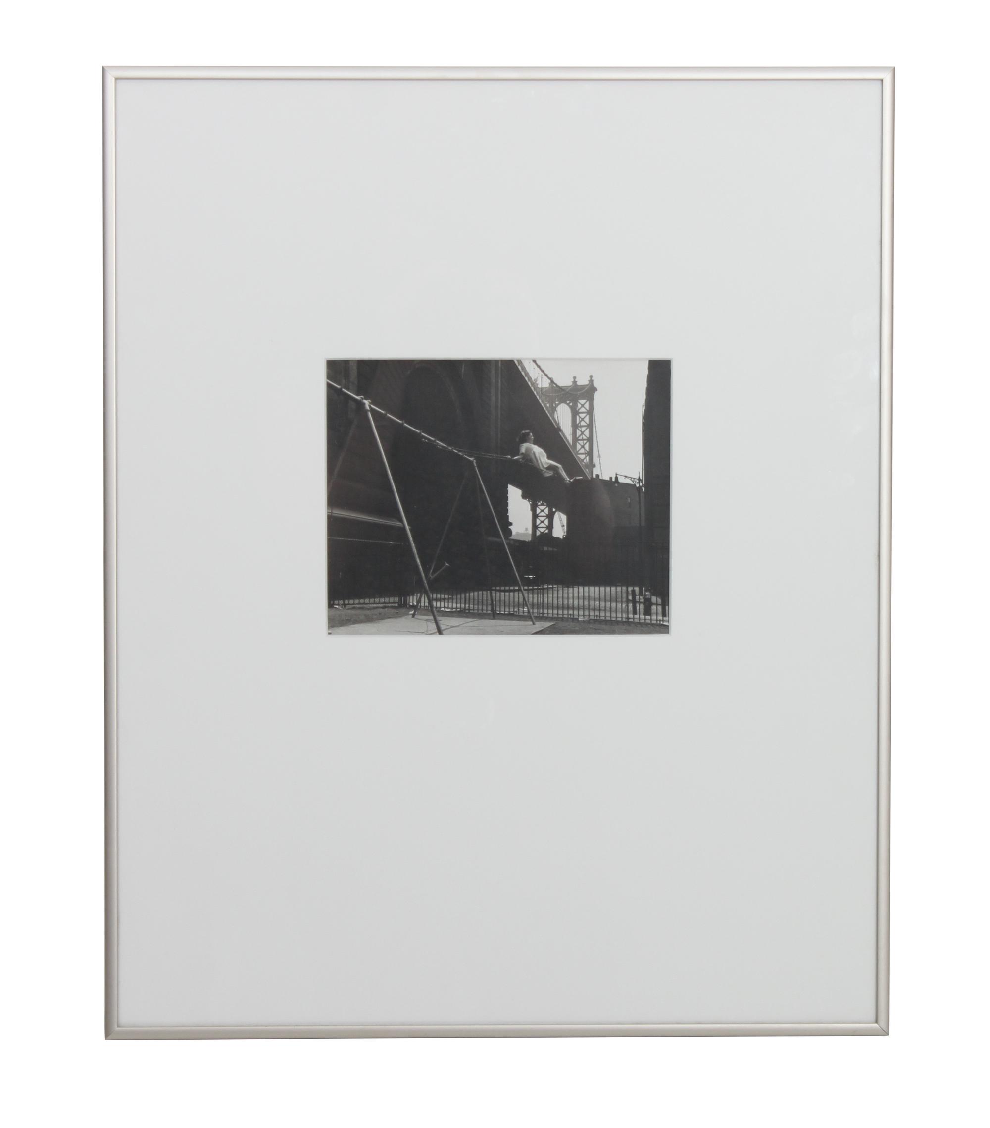 Walter Rosenblum, (American, 1919-2000), Girl on Swing, Pitt Street, New York, 1938