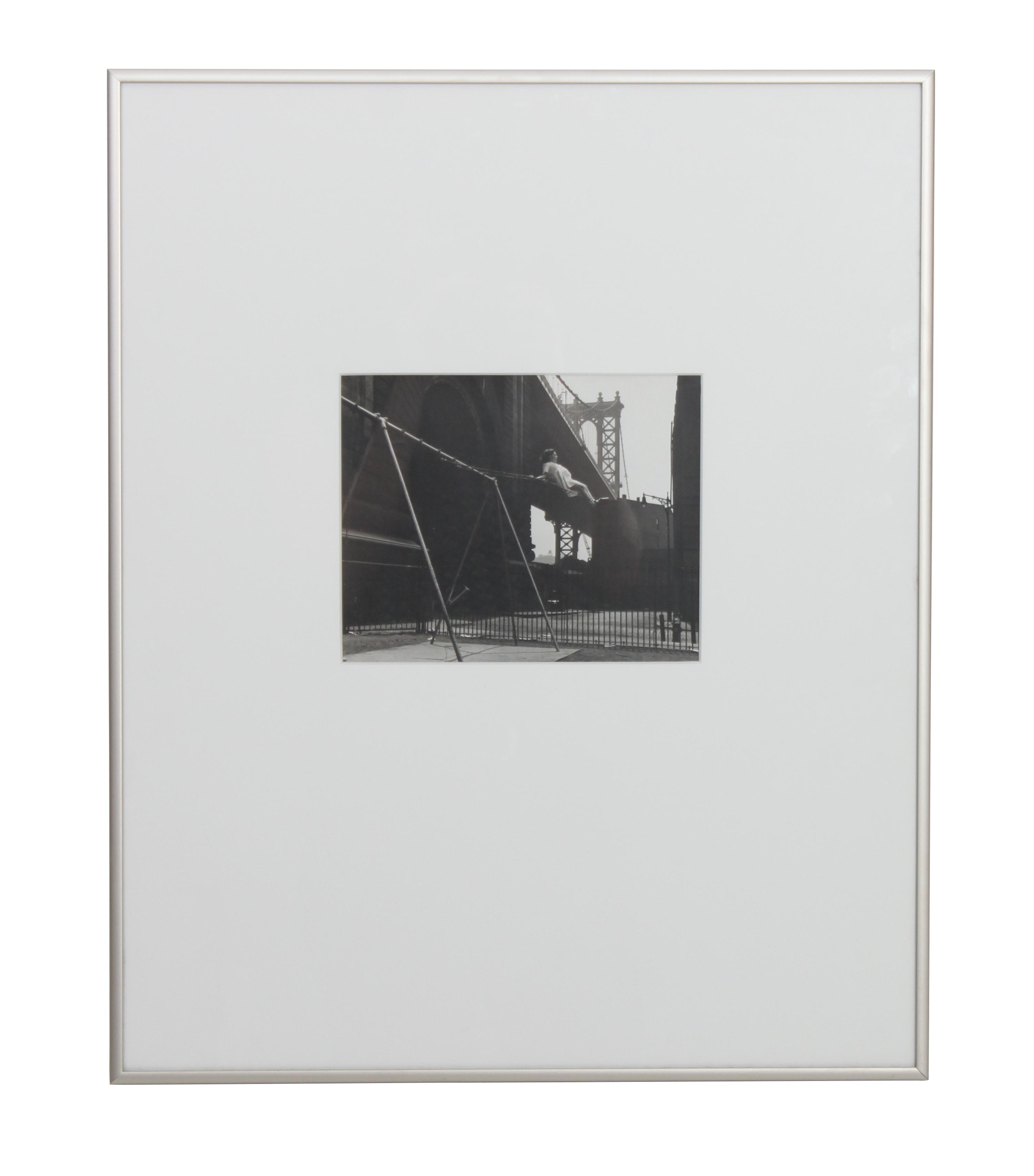 Walter Rosenblum, (American, 1919-2000), Girl on Swing, Pitt Street, New York, 1938