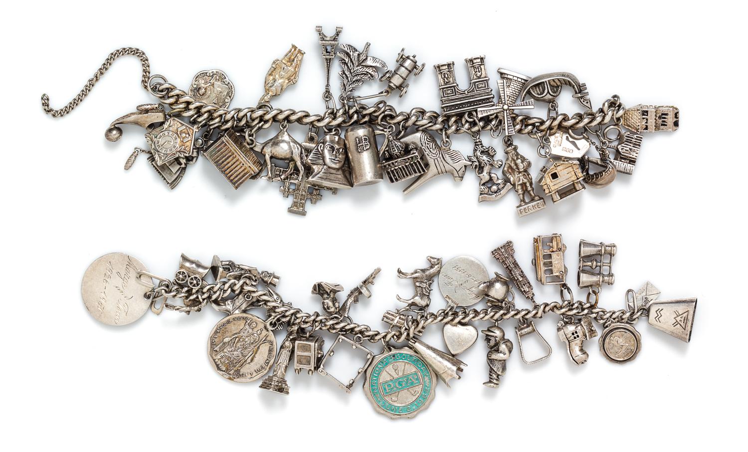 A Collection of Silver Charm Bracelets with Numerous Attached Charms, 137.80 dwts.