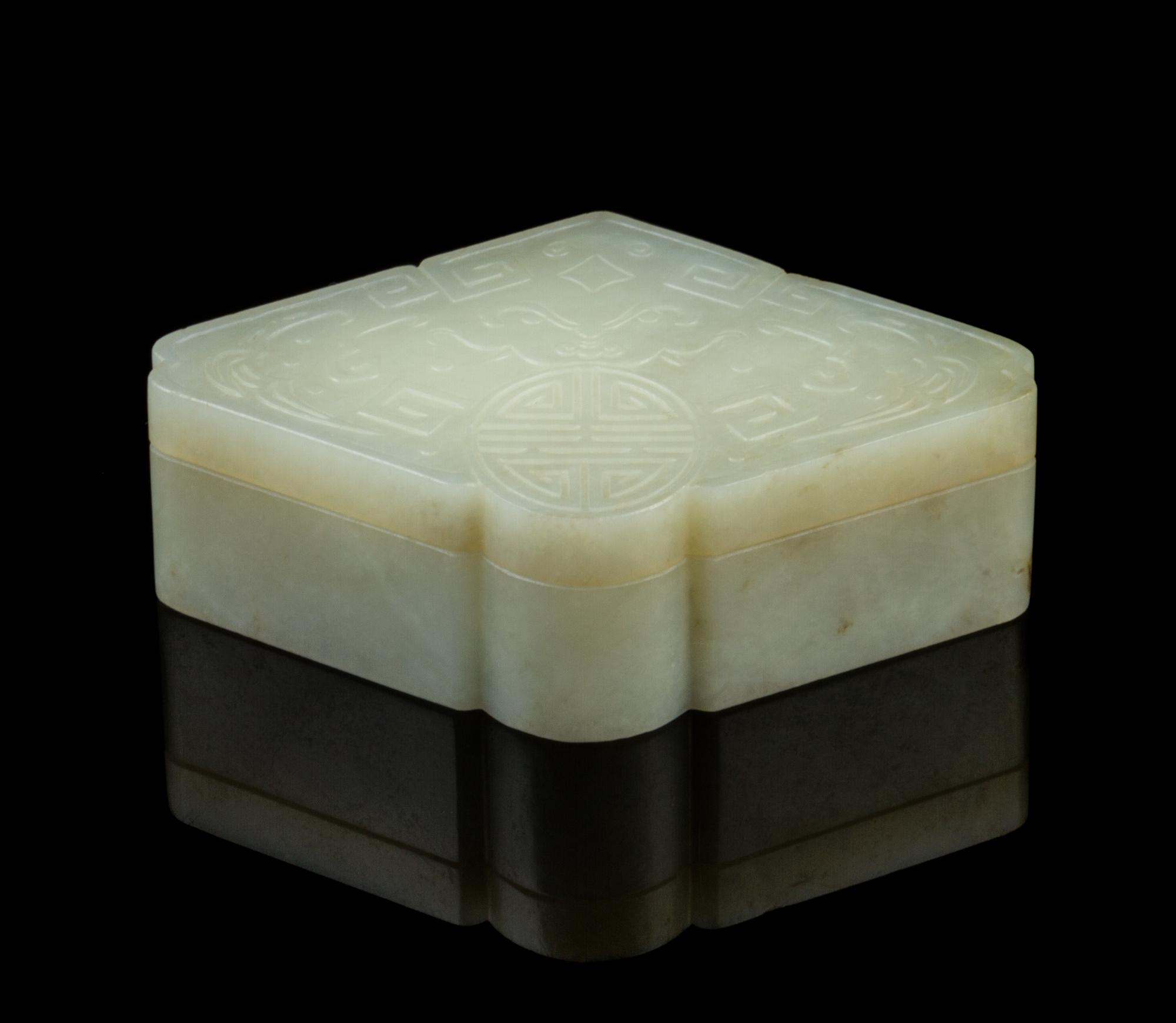A Chinese Celadon Jade Lozenge Shape Box 18TH CENTURY, QIANLONG PERIOD Width 3 1/2 inches. — 18TH CENTURY, QIANLONG PERIOD