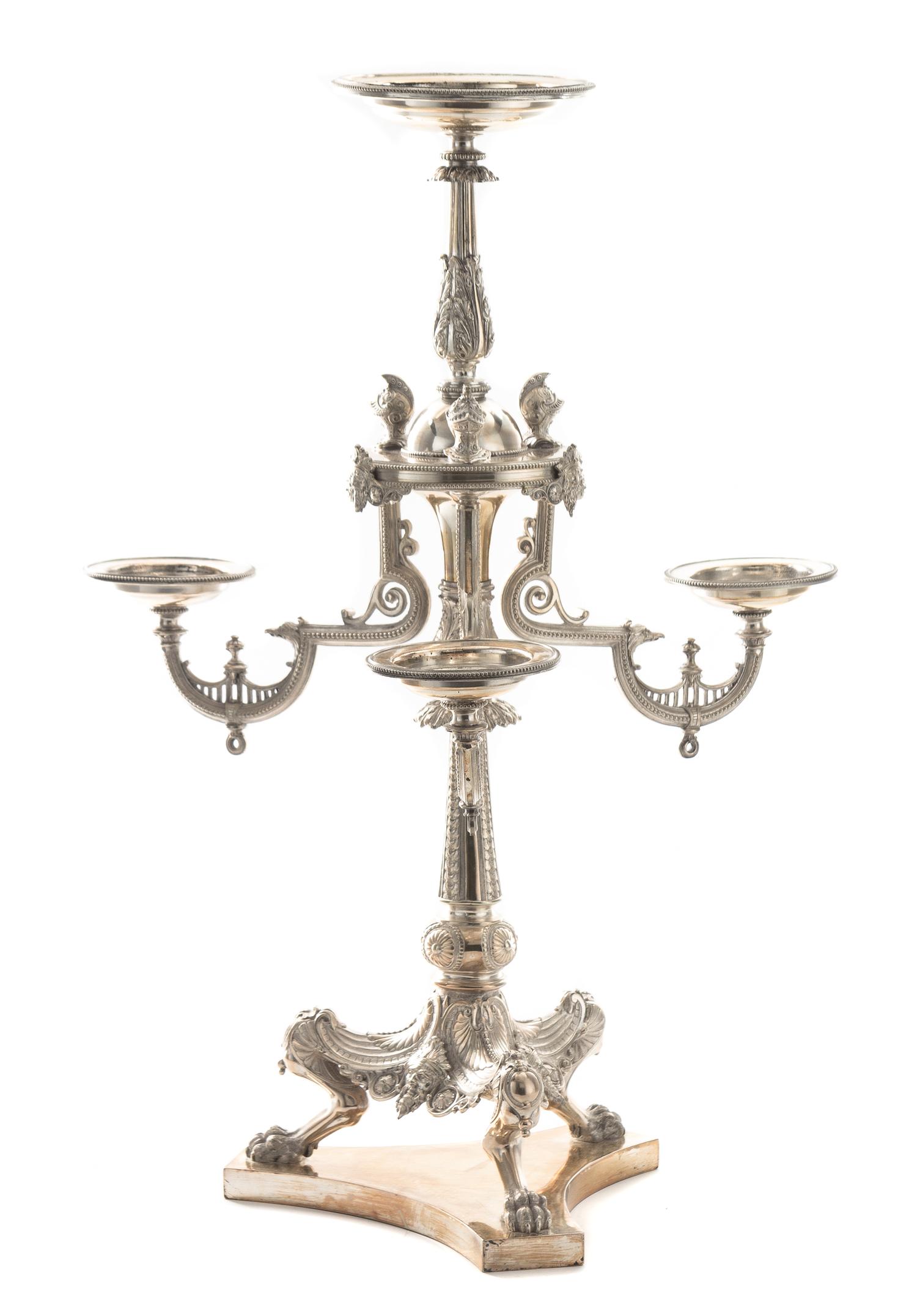A Victorian Silver-Plate Epergne, 19th Century, the central baluster form stem supporting a central dish and worked to show helmets, ma