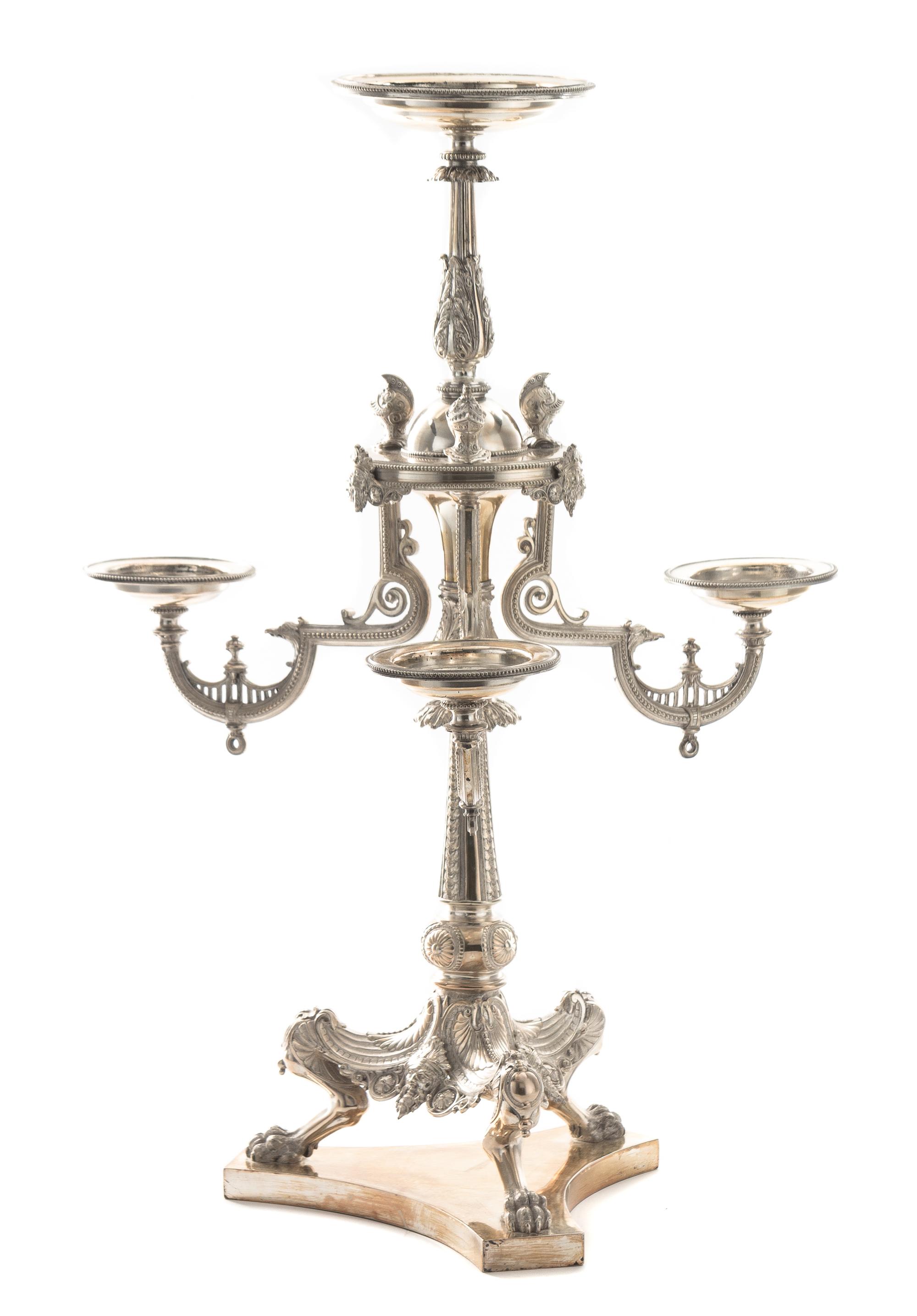 A Victorian Silver-Plate Epergne, 19th Century, the central baluster form stem supporting a central dish and worked to show helmets, ma