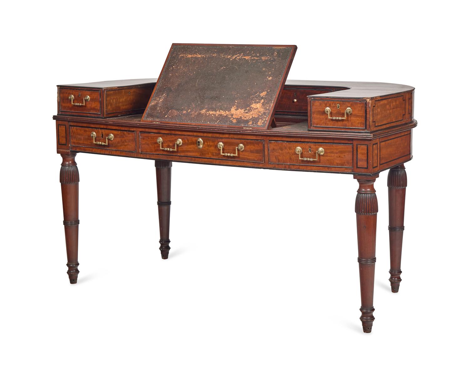 An English Satinwood, Mahogany and Parcel-Ebonized Carlton House Desk Once Owned by William Vincent Astor (1891-1959)