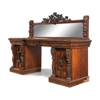An English Renaissance Revival Carved Oak Serving Table