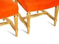 A Set of Eight Giltwood Dining Chairs
