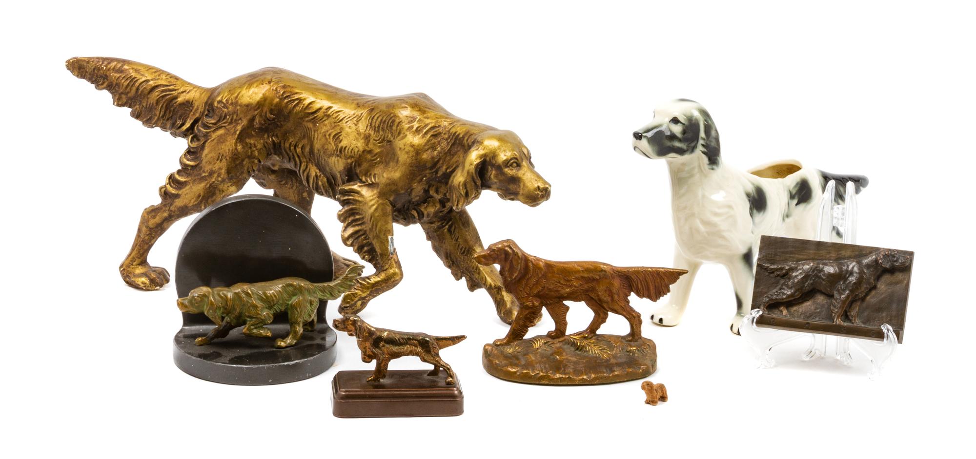 A Group of Seven English Setter Figures Width of widest 15 1/4 inches.