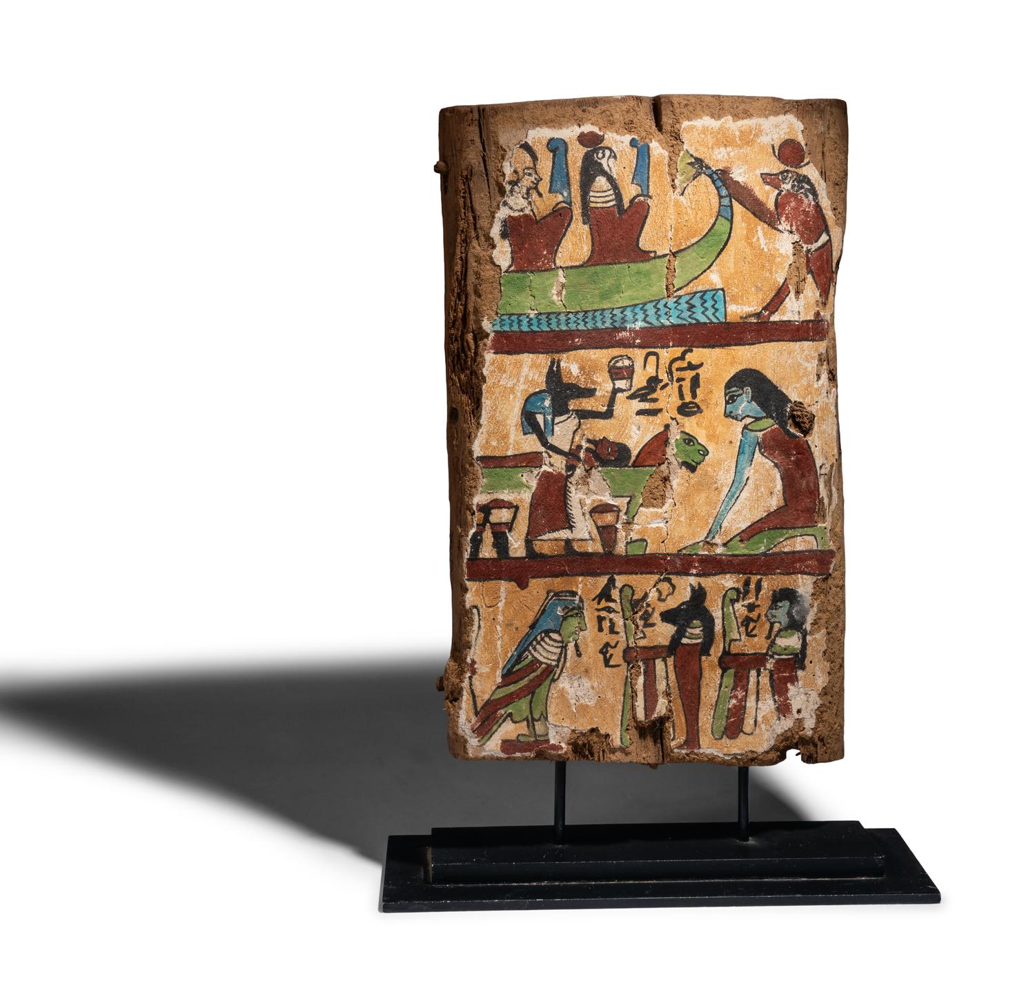An Egyptian Painted Wood Sarcophagus Fragment with a Boat Scene