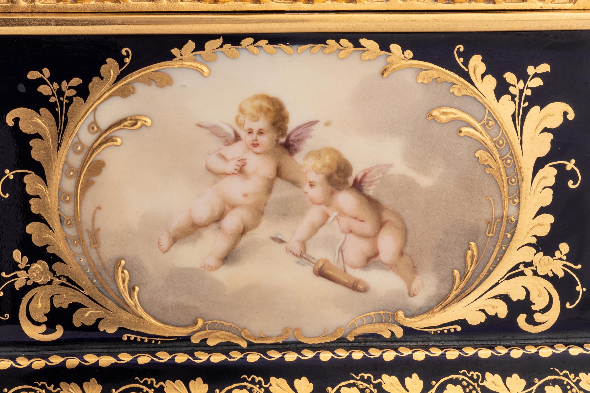 A Royal Vienna Porcelain Mounted Gilt Bronze Clock, Couaillet