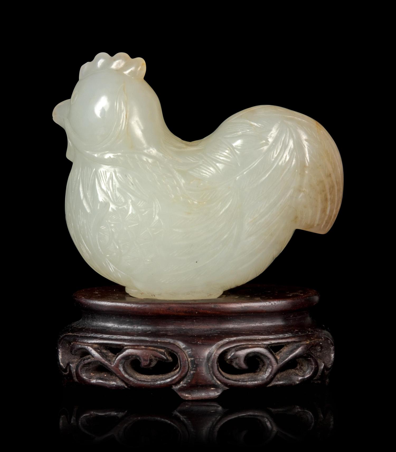 A Carved Pale Celadon and Russet Jade Figure of Rooster