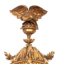 A Regency Carved Giltwood Convex Girandole Mirror by Thomas Fentham