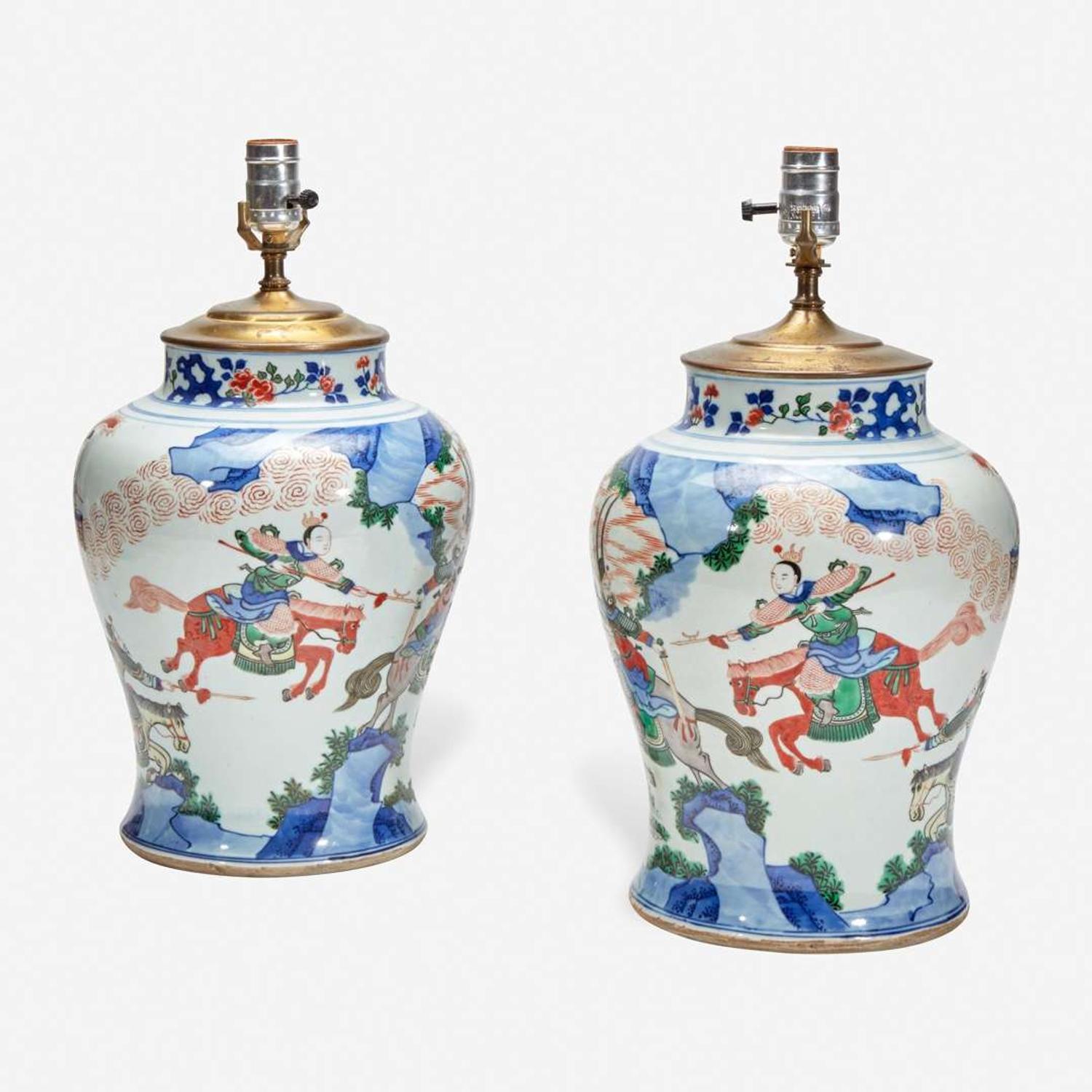 A pair of large Chinese wucai-decorated porcelain jars, mounted as lamps