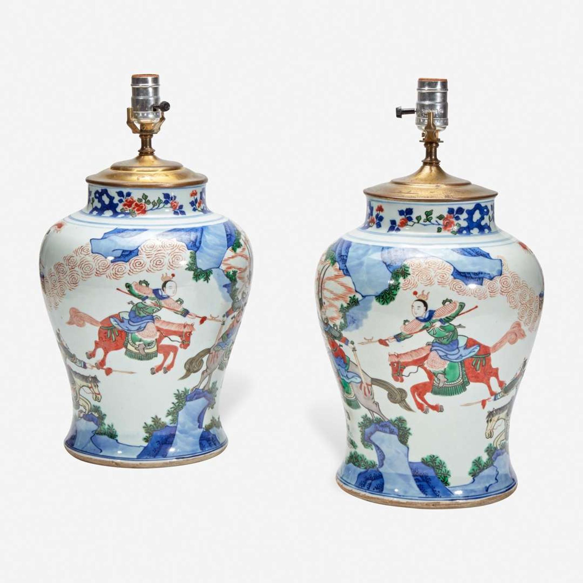 A pair of large Chinese wucai-decorated porcelain jars, mounted as lamps