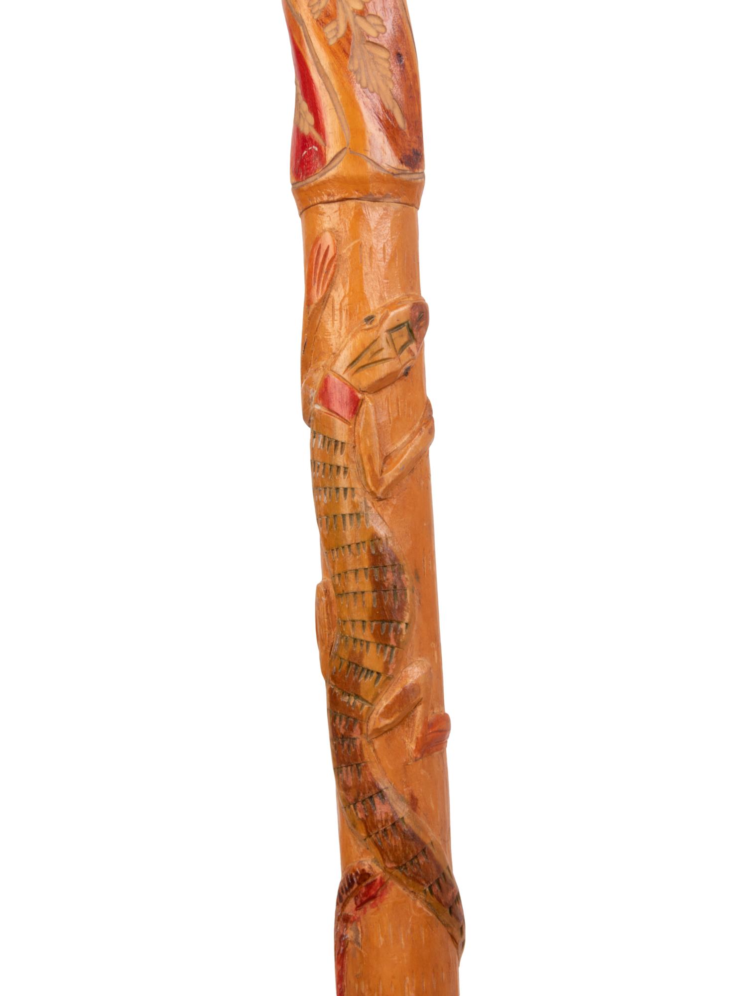A Folk Art Snake and Alligator Carved Walking Stick