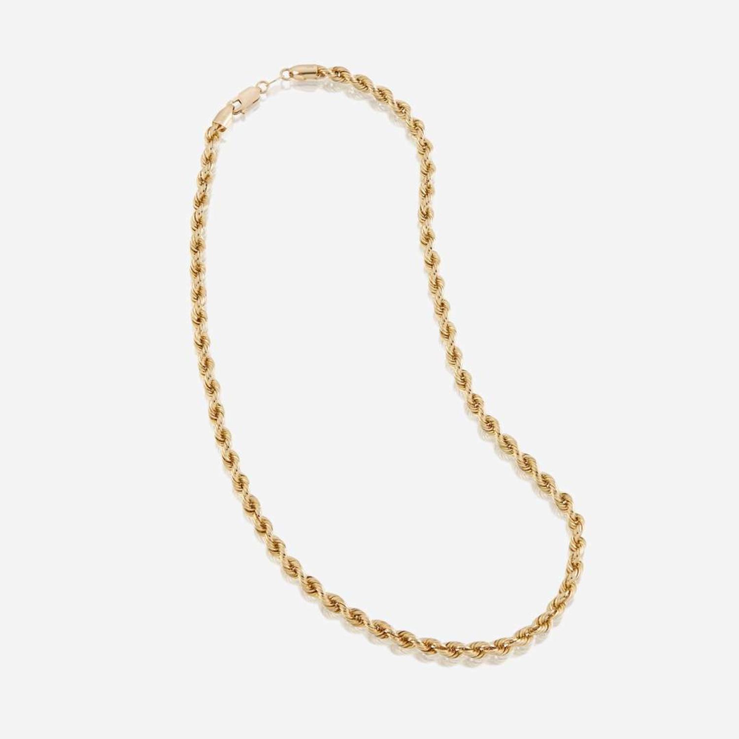 A collection of thirteen fourteen karat gold necklaces