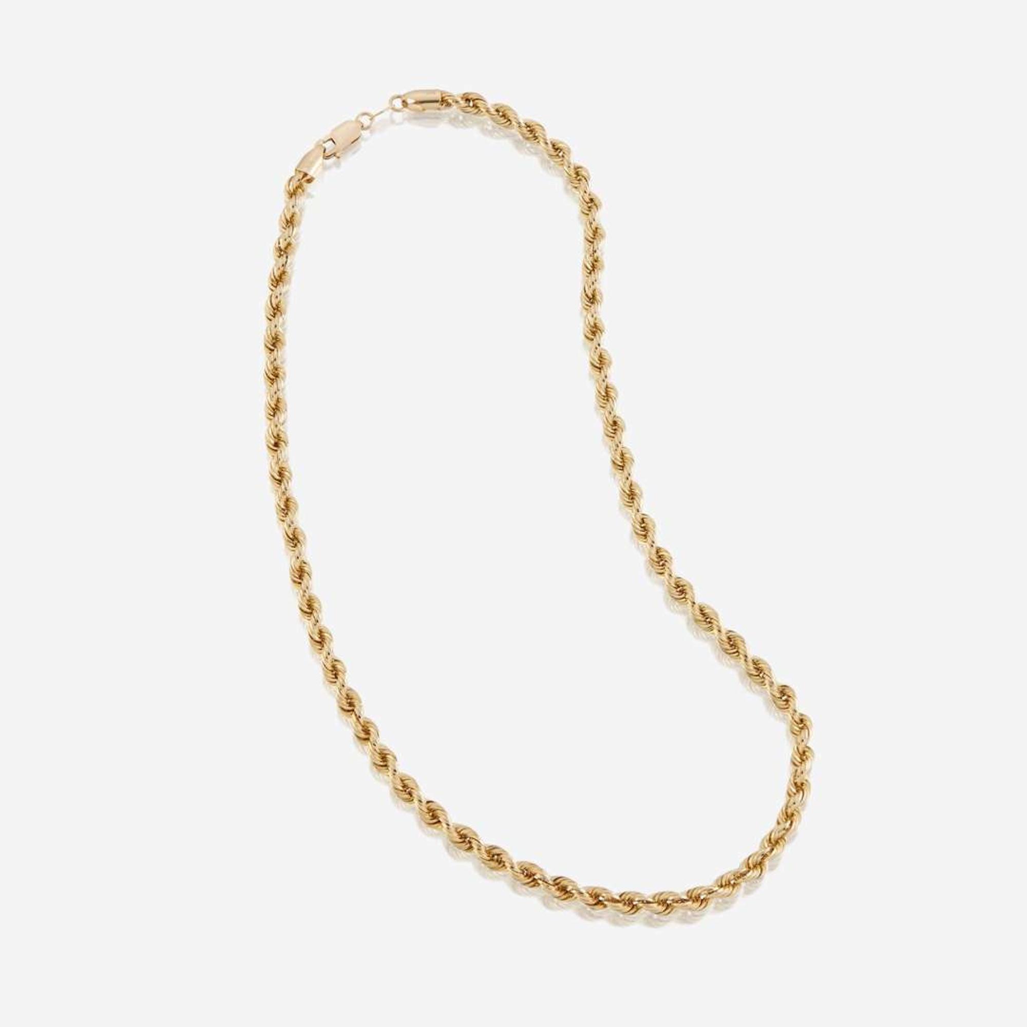 A collection of thirteen fourteen karat gold necklaces