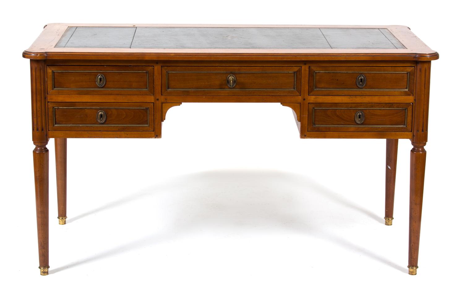 A Louis Philippe Style Leather Top Writing Desk Height 31 1/2 x width 55 x depth 27 inches. — 19TH CENTURY