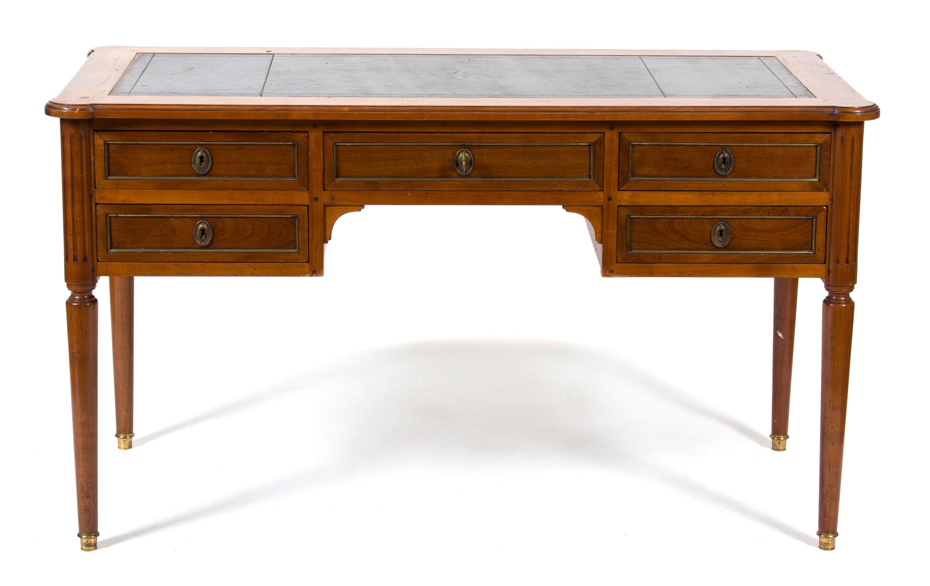 A Louis Philippe Style Leather Top Writing Desk Height 31 1/2 x width 55 x depth 27 inches. — 19TH CENTURY
