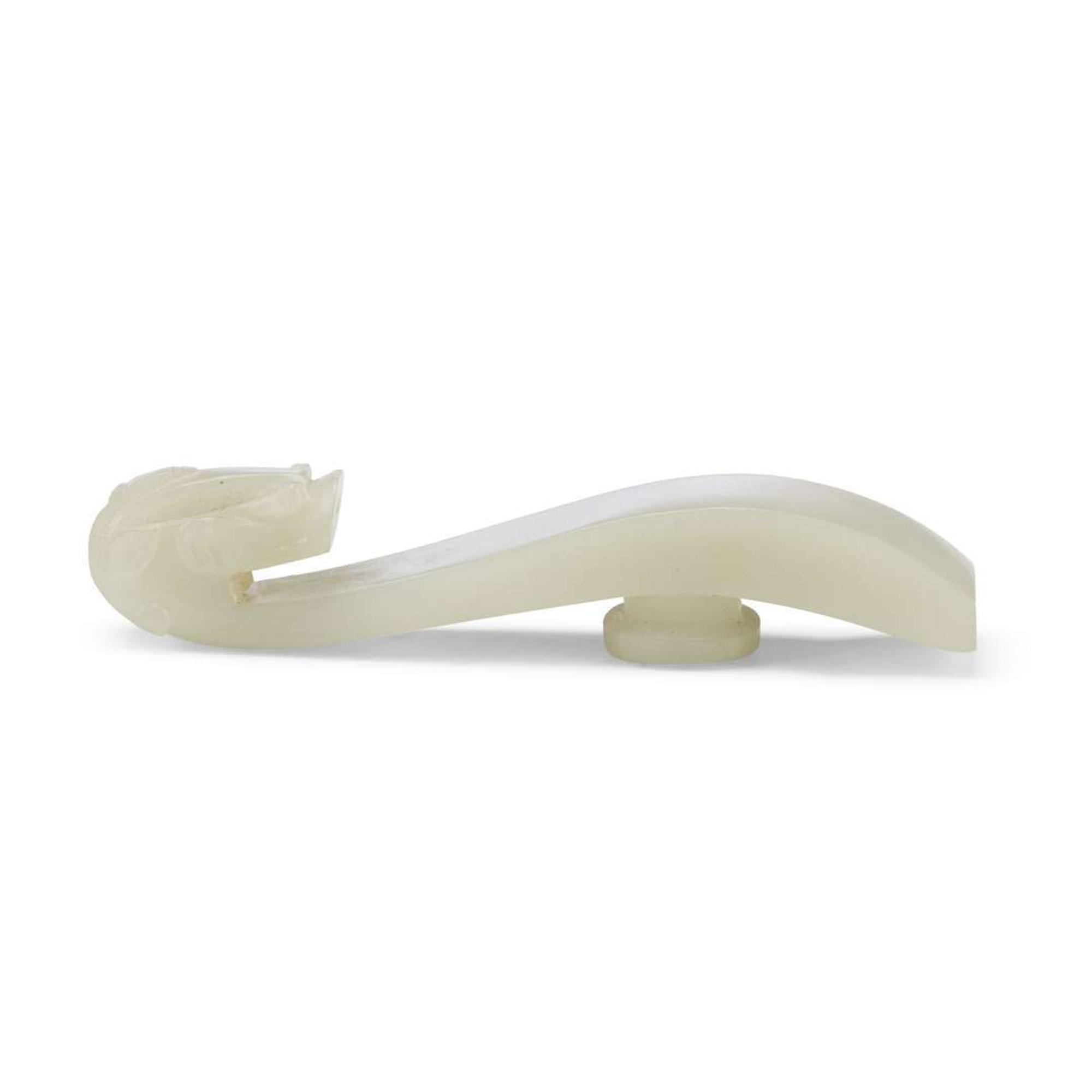 Four Chinese Greyish White Jade "Dragon" Head Belt Hooks, Qing Dynasty — 清 灰白玉龍鉤四件