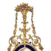 A Pair of Neoclassical Cobalt Glass-Inset and Giltwood Mirrors