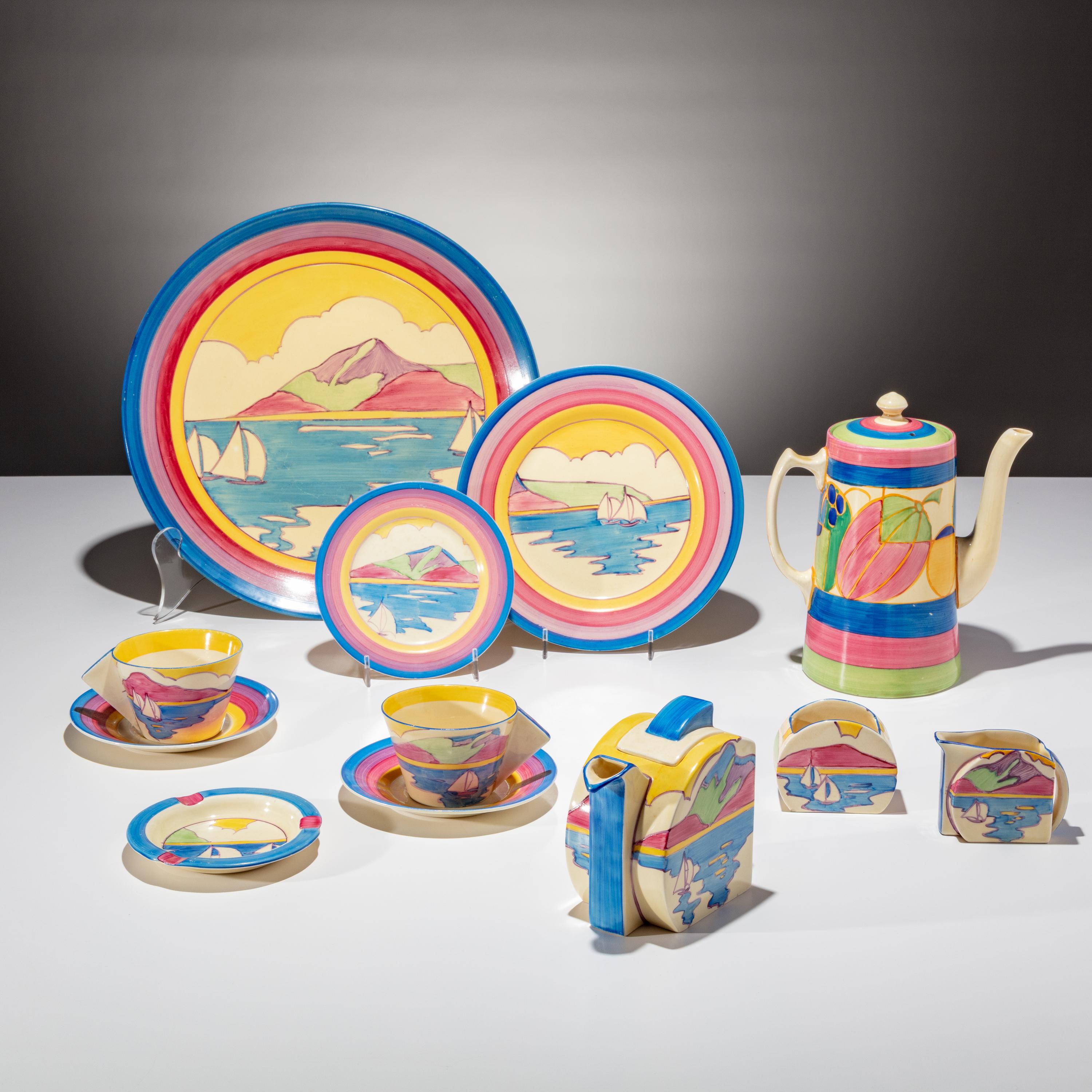 Clarice Cliff (English, 1899–1972) — Gibraltar pattern , 9 pieces and one Melon pattern Coffee Tankard