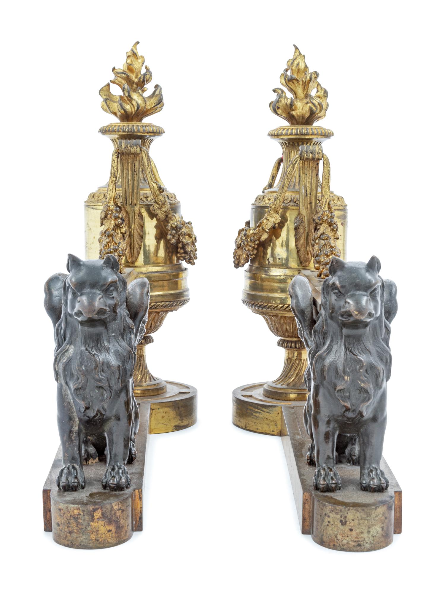 A Pair of Empire Style Gilt and Patinated Bronze Chenets