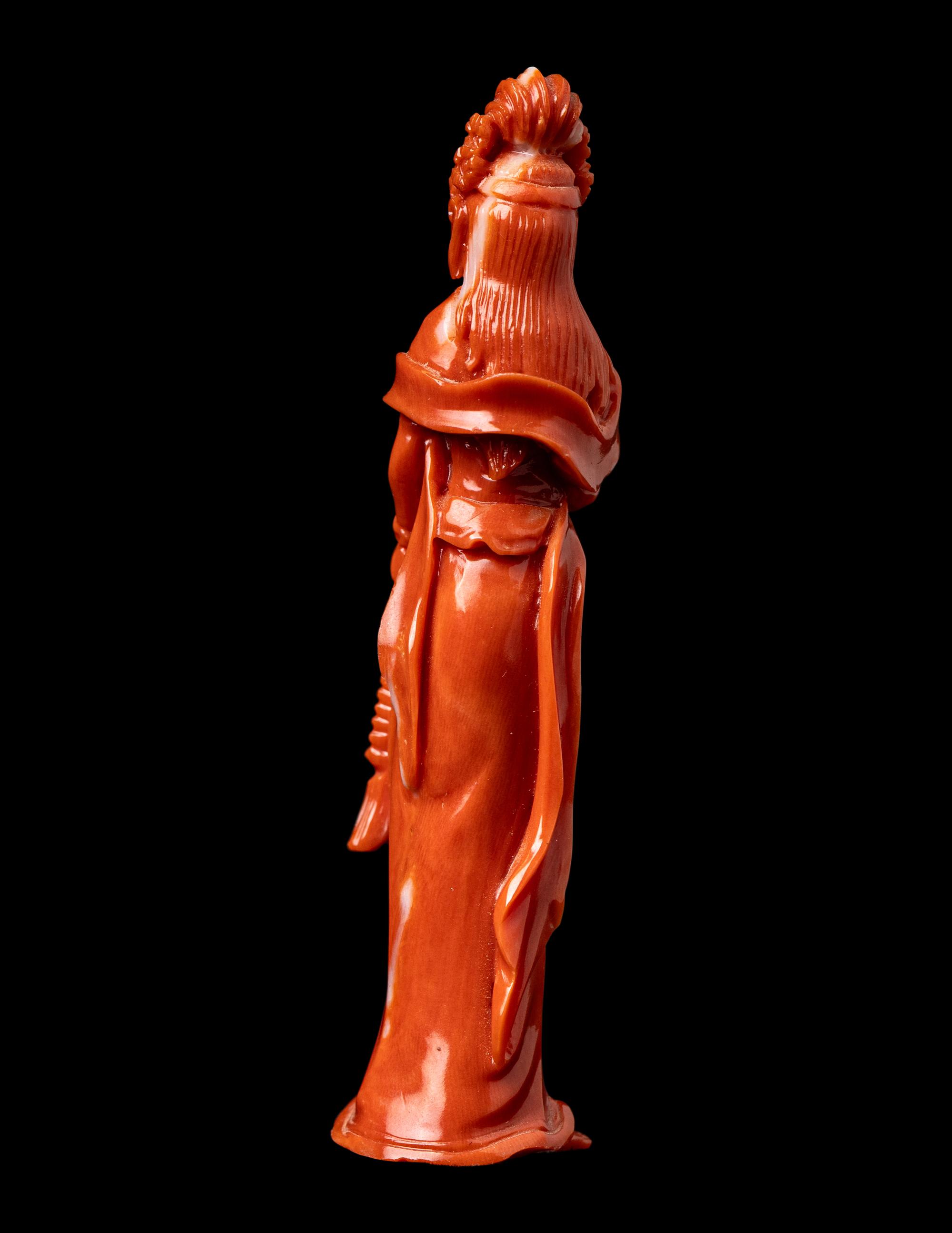 A Small Chinese Red Coral Figure of Guanyin