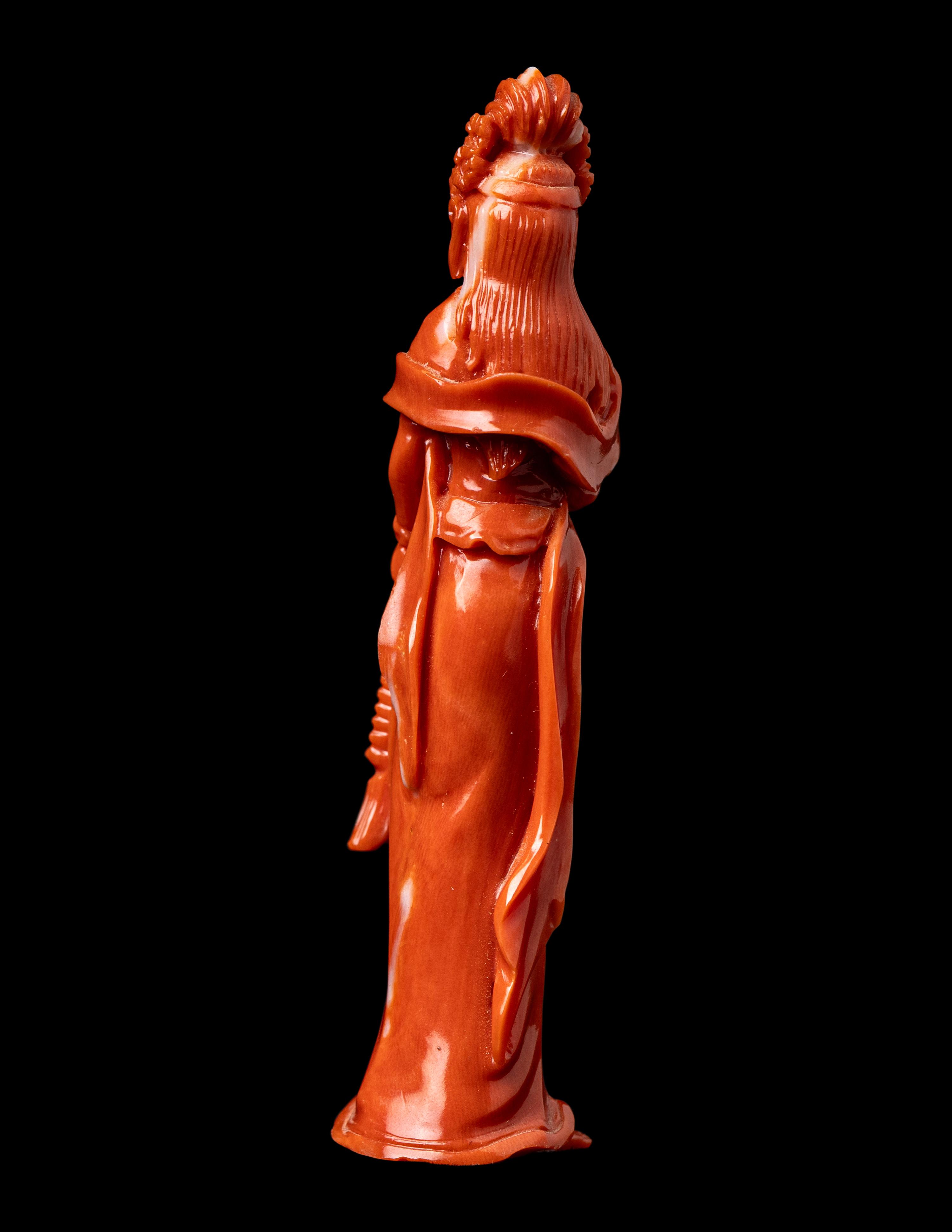 A Small Chinese Red Coral Figure of Guanyin