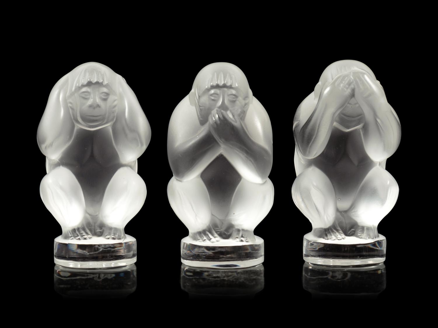 A Set of Three Lalique Sagesse Figures
