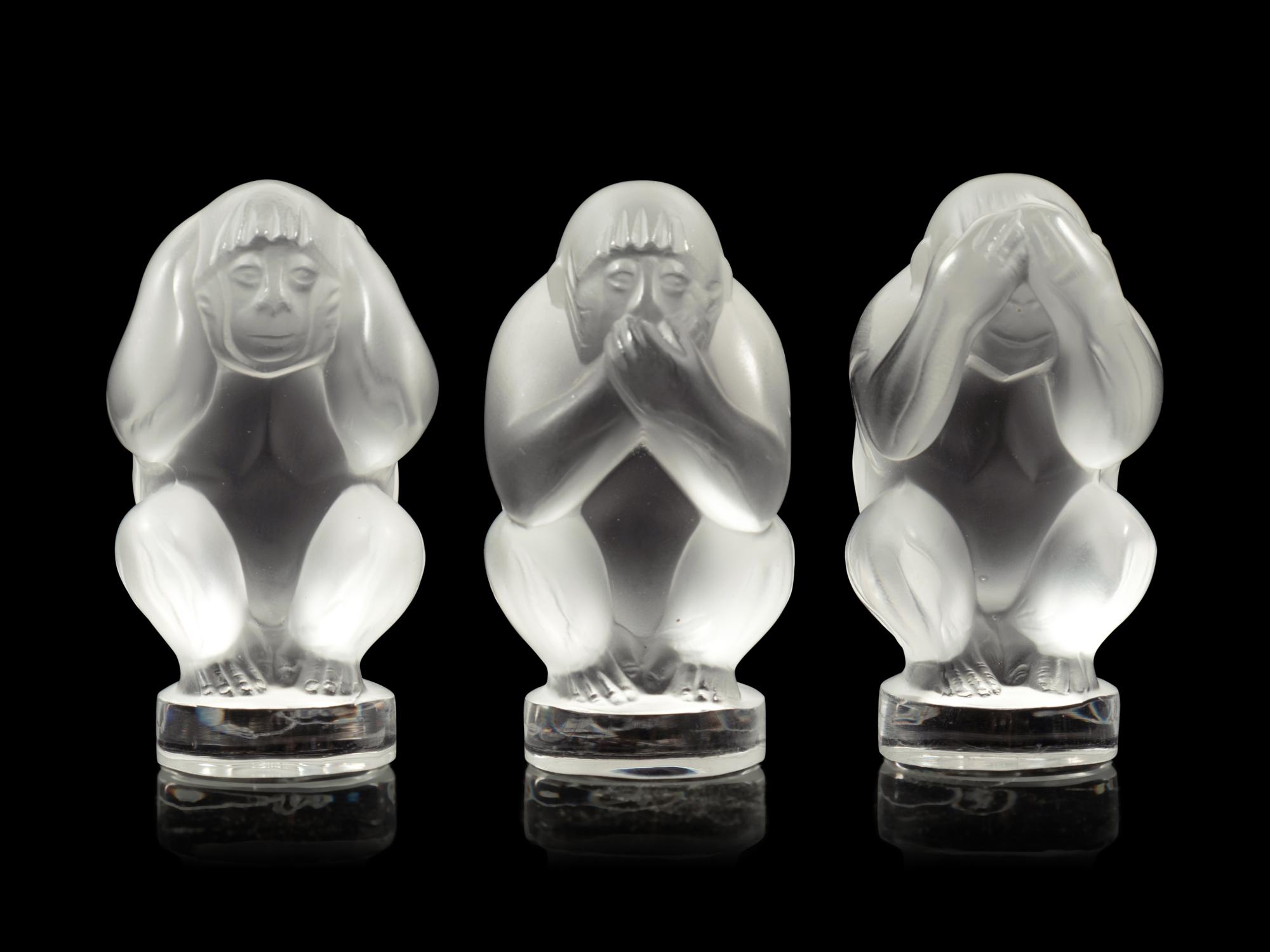 A Set of Three Lalique Sagesse Figures