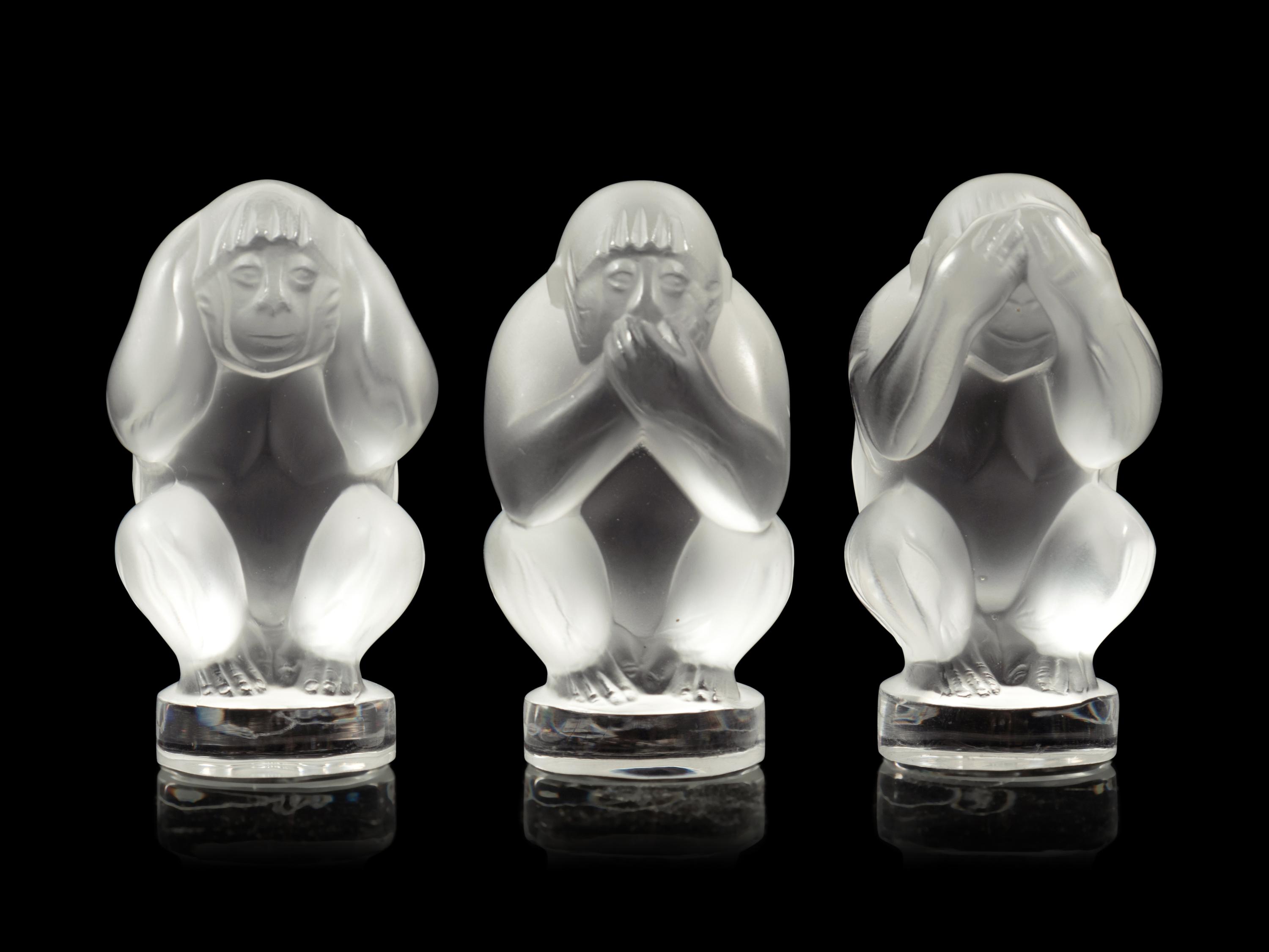 A Set of Three Lalique Sagesse Figures